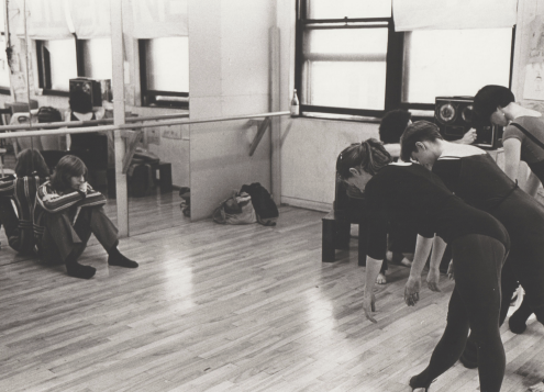 Dancers rehearse in a studio